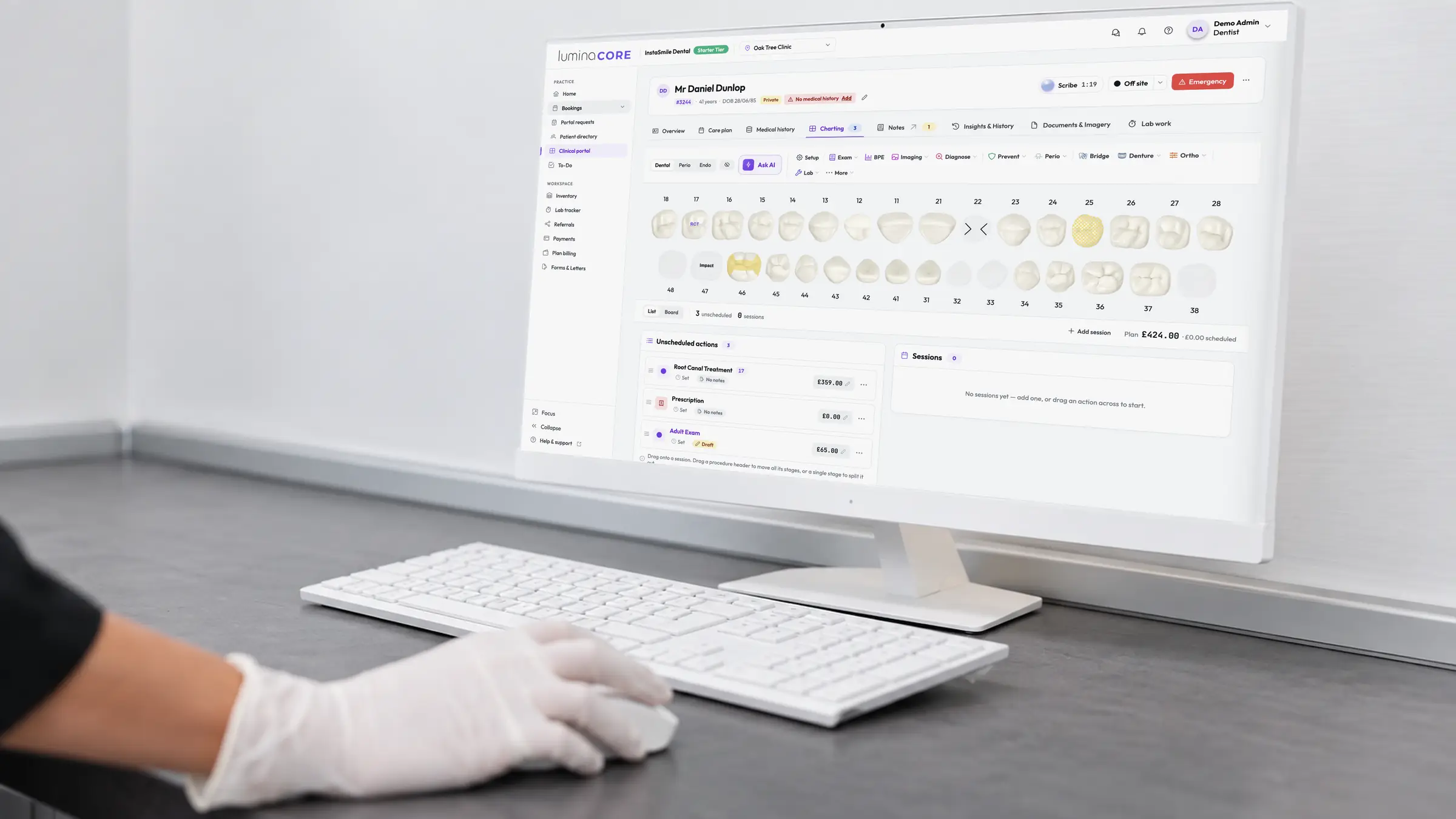 A clinician charting in Lumina Core on a desktop monitor